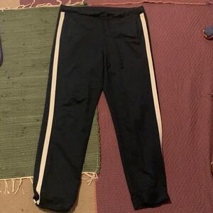 Navy blue track pants.